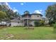 House with a large backyard and detached shed at 1399 Old Mount Dora Rd, Eustis, FL 32726