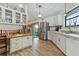 Modern kitchen with stainless steel refrigerator and ample counter space at 1399 Old Mount Dora Rd, Eustis, FL 32726