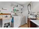 Laundry room with washer, dryer, sink, and shelving for storage at 1399 Old Mount Dora Rd, Eustis, FL 32726