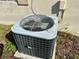 Exterior AC unit on a concrete pad, surrounded by some foliage at 1456 N Page Dr, Deltona, FL 32725