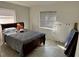 Simple bedroom with natural light, perfect for relaxation or as a guest space at 1456 N Page Dr, Deltona, FL 32725