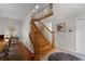 Elegant wooden staircase connecting the floors of this home at 14802 Hawksmoor Run Cir, Orlando, FL 32828