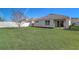 Large backyard with grassy lawn at 273 St Georges Cir, Eagle Lake, FL 33839