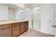 Double vanity bathroom with a large shower at 273 St Georges Cir, Eagle Lake, FL 33839