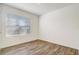 Bright bedroom with vinyl flooring and window blinds at 273 St Georges Cir, Eagle Lake, FL 33839
