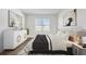 Spacious bedroom with large window and modern furnishings at 273 St Georges Cir, Eagle Lake, FL 33839