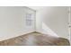 Well-lit bedroom featuring vinyl flooring and window blinds at 273 St Georges Cir, Eagle Lake, FL 33839