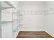 Spacious closet with ample shelving and hanging space at 273 St Georges Cir, Eagle Lake, FL 33839