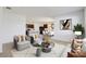 Open living room with adjacent kitchen and dining area at 273 St Georges Cir, Eagle Lake, FL 33839