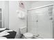 Bathroom with a walk-in shower and toilet at 2821 Almaton Loop # 101, Kissimmee, FL 34747