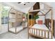 bedroom with wooden bunk beds and tree mural at 2821 Almaton Loop # 101, Kissimmee, FL 34747