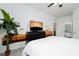 Bedroom with a dresser, TV, and safari-themed wall art at 2821 Almaton Loop # 101, Kissimmee, FL 34747