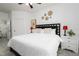 King-size bed, accent wall, and tiled floors at 2821 Almaton Loop # 101, Kissimmee, FL 34747