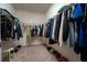 Large walk-in closet with ample hanging space and shelving at 285 Miro Dr, Davenport, FL 33837