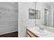Bright bathroom with a single sink vanity and a shower/tub combo at 4008 Crossroads Pl, Casselberry, FL 32707