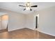 Large bedroom featuring hardwood floors and a ceiling fan at 4008 Crossroads Pl, Casselberry, FL 32707