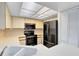 Bright kitchen featuring modern black appliances and ample counter space at 4008 Crossroads Pl, Casselberry, FL 32707