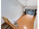 Open-concept living room with wood floors and sliding glass doors to the deck at 4008 Crossroads Pl, Casselberry, FL 32707