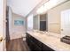 Bathroom with bathtub, toilet and granite countertop at 510 Canary Island Cir, Davenport, FL 33837
