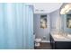 Bathroom with shower, toilet, and granite countertop at 510 Canary Island Cir, Davenport, FL 33837