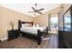 Bedroom with queen-size bed and lake view at 510 Canary Island Cir, Davenport, FL 33837
