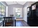 Bright kitchen features a table for two and a black refrigerator at 510 Canary Island Cir, Davenport, FL 33837