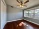 Bedroom with wood floors and ceiling fan at 536 Palm Dr, Winter Garden, FL 34787