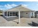 Covered patio with hot tub and brick pavers at 604 Endsley Ave, Altamonte Springs, FL 32701