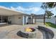 Backyard with fire pit and pergola at 604 Endsley Ave, Altamonte Springs, FL 32701