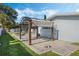 Outdoor patio area with pergola, providing shade and ambiance at 604 Endsley Ave, Altamonte Springs, FL 32701