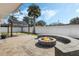 Relaxing backyard patio with fire pit and pergola, perfect for outdoor gatherings at 604 Endsley Ave, Altamonte Springs, FL 32701