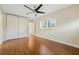 Charming bedroom with wood floors and a view from the window at 604 Endsley Ave, Altamonte Springs, FL 32701