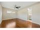 Spacious bedroom featuring wood floors and ensuite bathroom access at 604 Endsley Ave, Altamonte Springs, FL 32701