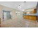 Kitchen and dining area with light tile floors and wood cabinets at 604 Endsley Ave, Altamonte Springs, FL 32701