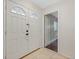 Inviting entryway with double doors and tile flooring at 604 Endsley Ave, Altamonte Springs, FL 32701