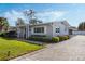 Gray house with landscaped yard and paver driveway at 604 Endsley Ave, Altamonte Springs, FL 32701
