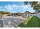 Large paved driveway and updated exterior with backyard access at 604 Endsley Ave, Altamonte Springs, FL 32701