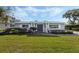 Ranch-style home with a well-manicured lawn at 604 Endsley Ave, Altamonte Springs, FL 32701