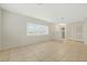 Bright and airy living room with tile flooring and neutral walls at 604 Endsley Ave, Altamonte Springs, FL 32701