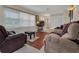 Comfortable living room with hardwood floors and neutral decor at 604 Endsley Ave, Altamonte Springs, FL 32701