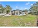 Renovated home with expansive backyard, offering a tranquil lake view at 6424 Sleepy Hollow Dr, Orlando, FL 32810