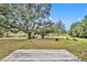 Deck overlooking a pond and a spacious backyard at 6424 Sleepy Hollow Dr, Orlando, FL 32810