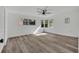 Spacious bedroom with hardwood floors and large windows at 6424 Sleepy Hollow Dr, Orlando, FL 32810