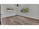 Bright bedroom with hardwood floors and ceiling fan at 6424 Sleepy Hollow Dr, Orlando, FL 32810