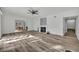 Spacious living room featuring hardwood floors and a fireplace at 6424 Sleepy Hollow Dr, Orlando, FL 32810