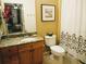 Bathroom with granite countertop and shower/tub combo at 8103 Coconut Palm Way # 105, Kissimmee, FL 34747