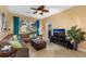 Spacious living room with comfortable sectional sofa and large TV at 8103 Coconut Palm Way # 105, Kissimmee, FL 34747