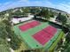 Two well-lit tennis courts at 8103 Coconut Palm Way # 105, Kissimmee, FL 34747