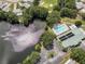 Community pool, lake, and clubhouse at 843 Challenger Ave, Davenport, FL 33897