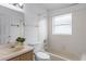 Clean bathroom with tub and single vanity at 843 Challenger Ave, Davenport, FL 33897